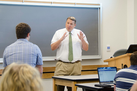 Matt Miles consults with a student one on one.