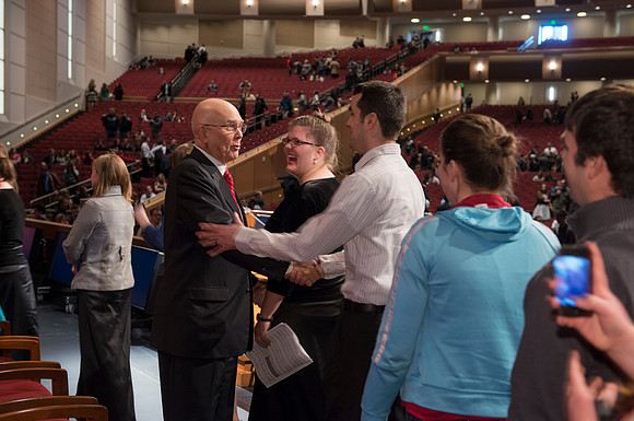 Elder Oaks takes time after devotional to shake hands with students. BYU-Idaho, photos by Michael Lewis