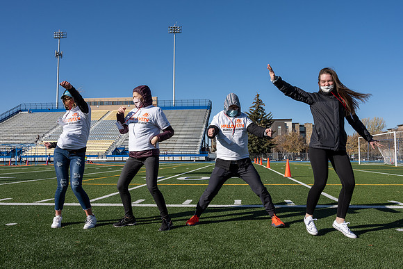 BYU-Idaho employees and their families enjoy a beautiful fall day at the stadium track.