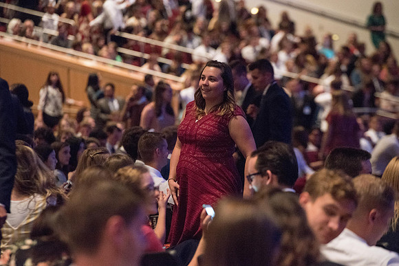 BYU-Idaho Devotional. Guest speaker Elder David A. Bednar and his wife. Students getting ready to listen. Fall Semester