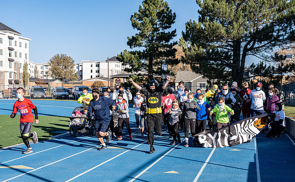 BYU-Idaho employees and their families enjoy a beautiful fall day at the stadium track.