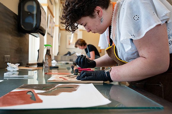 Students working in Printmaking 2 in the Spori Building.