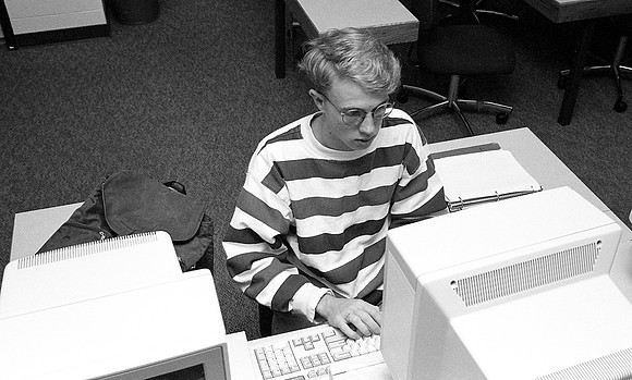 Students participating in an English computer class