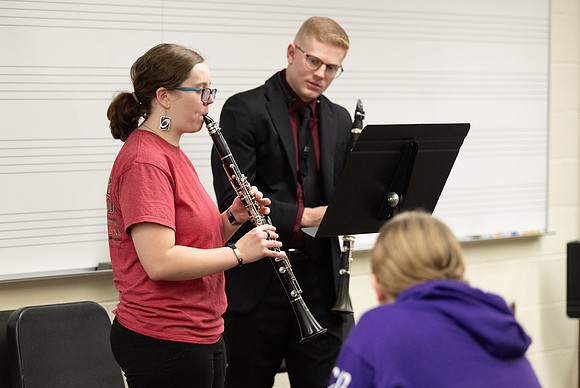 Members of the United States Marine Band work with students in a Masters class.