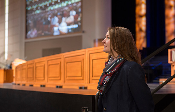 Behind the scenes of devotional ushers stand ready to help direct traffic.