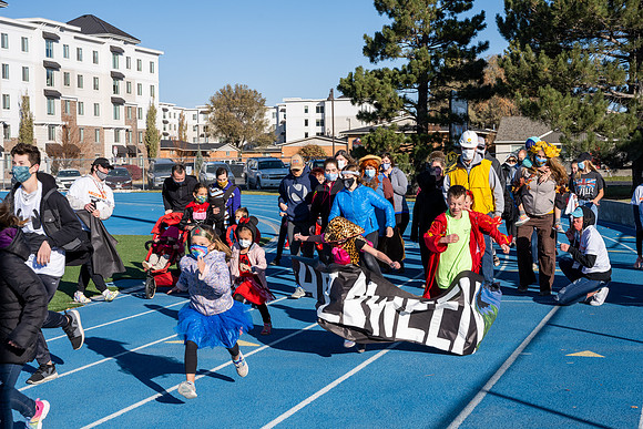 BYU-Idaho employees and their families enjoy a beautiful fall day at the stadium track.