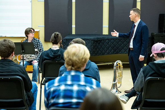 Members of the United States Marine Band work with students in a Masters class.