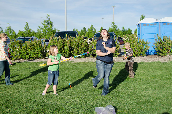 Online instructors gather with their families for an eveing of BBQ and games.
