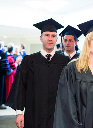 Graduates march the Processional into the I-Center.