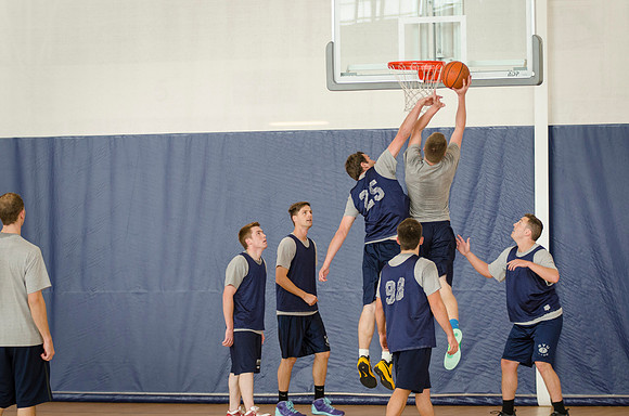 BYU-Idaho students playing basketball at the I-Center on campus