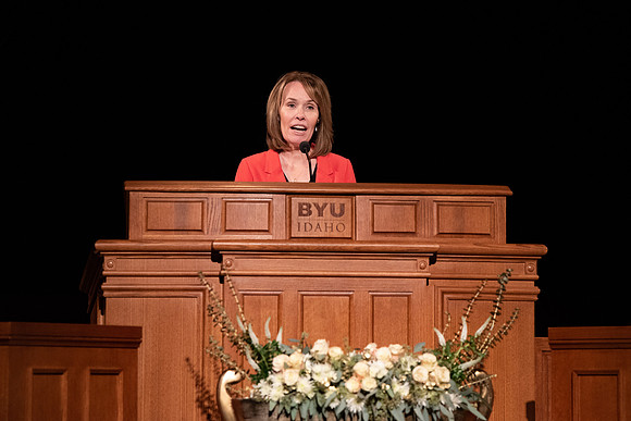 Amanda Kingsford speaks in devotional to an empty auditorium due to Covid-19 restrictions.