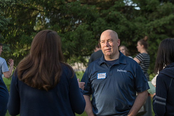 Pathway Worldwide employees and their families gather for a social in Rexburg. 2017