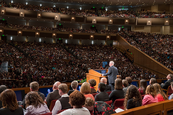 President Clark welcomes students to devotional.  Photo by Michael Lewis