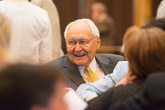 Elder L. Tom Perry, of the Quorum of the Twelve Apostles, chats with other attendees before the concert. Photo by Ryan Chase