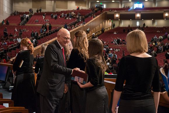 Elder Oaks takes time after devotional to shake hands with students. BYU-Idaho, photos by Michael Lewis