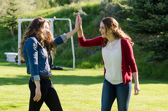 Students enjoy a lighthearted game of volleyball.