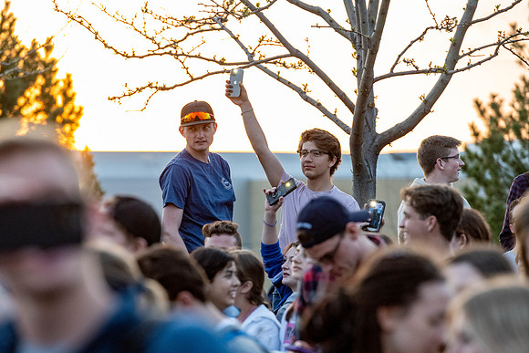 Students gather in the Taylor Quad. The hold paper lanterns, sing, and have fun together.