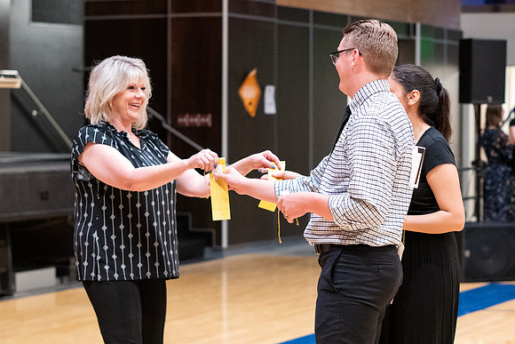 Students perform in a dance competition at the Hart Auditorium.