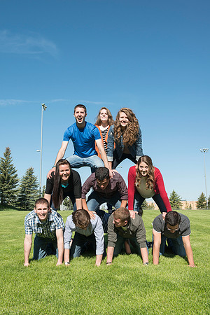Student models interact and smile for marketing purposes that will be used for the new Campus Housing next to The Ivy.