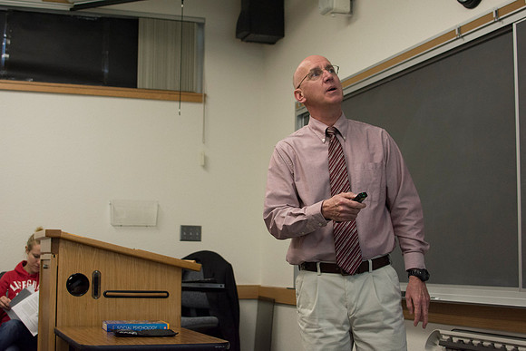 Brother Clay reviews the quiz questions with his Social Psychology class.