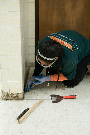 Servpro team members work hard to clean parts of the Smith Building.