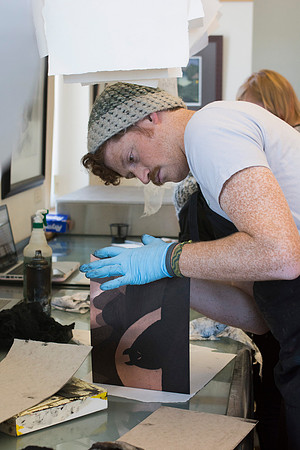 Art students at work in their hands-on print making class.