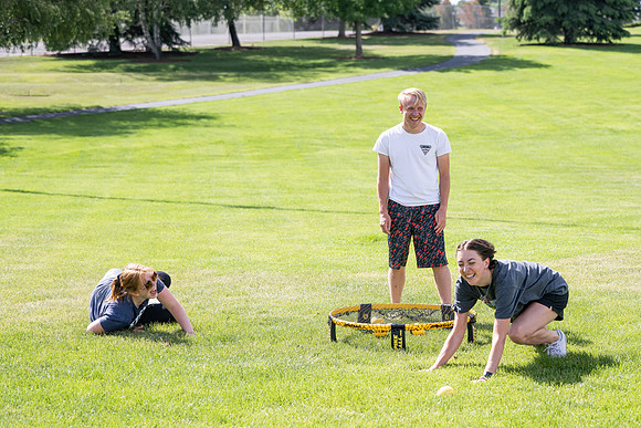 Students participate in the campus spikeball and cornhole tournament.