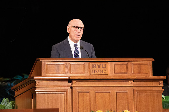 Elder Arnulfo Valenzuela of the Seventy speaks in devotional.