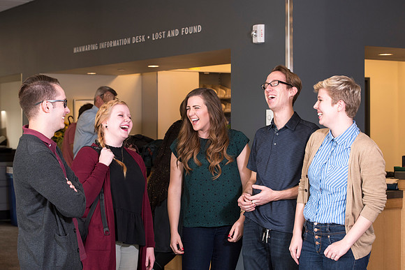 Information Technology students pose on campus for the department webpage.