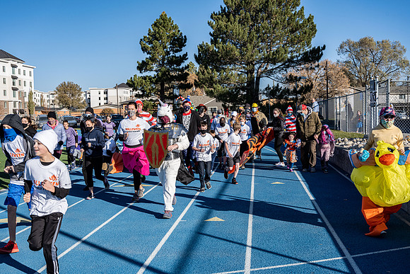 BYU-Idaho employees and their families enjoy a beautiful fall day at the stadium track.