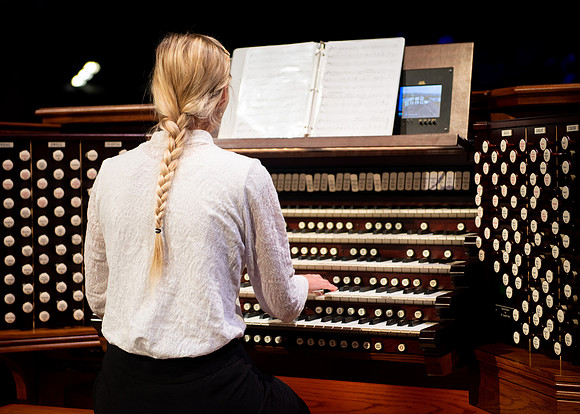 Organist playing at the devotional.