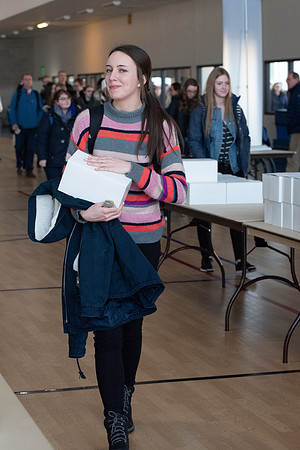 Students pick up their $2 box lunch after devotional for the first time.