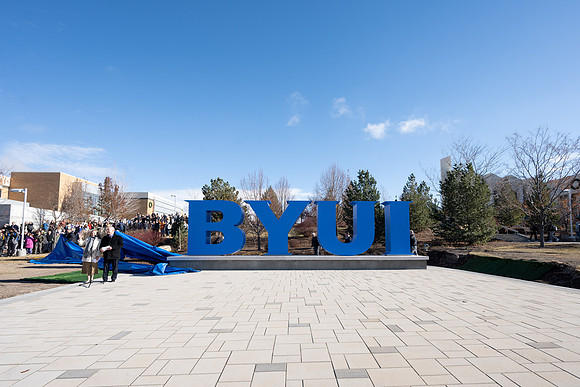 President and Sister Meredith participate in unveiling the new BYUI monument.
