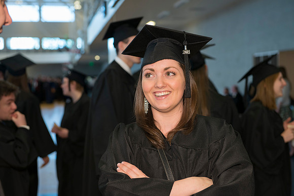 Graduates gather and march in during the processional for April 2014 Graduation ceremonies in the BYU-Idaho Center.