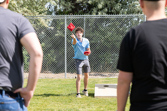 Students participate in the campus spikeball and cornhole tournament.