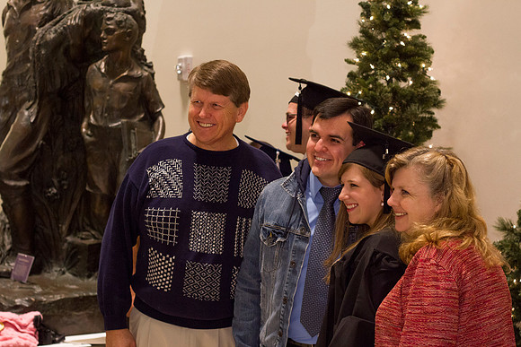 Graduates and family gather outside the I-Center after Commencement to mingle before Convocation.