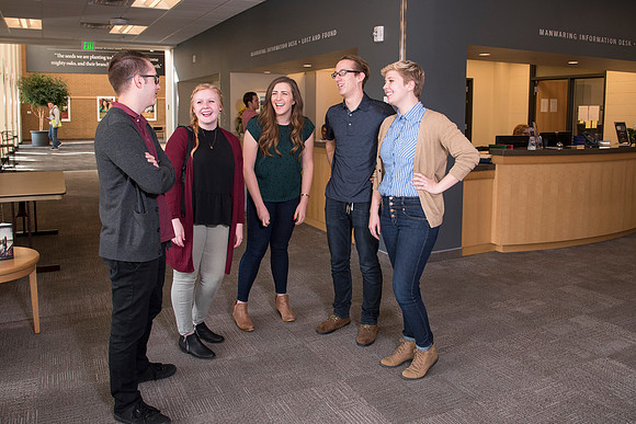 Information Technology students pose on campus for the department webpage.