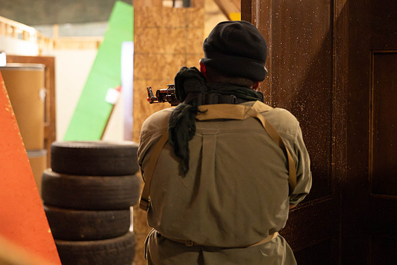 ROTC practices military tatics in an Advantage Airsoft facility.
