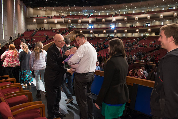 Elder Oaks takes time after devotional to shake hands with students. BYU-Idaho, photos by Michael Lewis