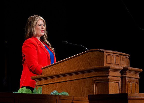 Giving the introduction to Sister Hall.
