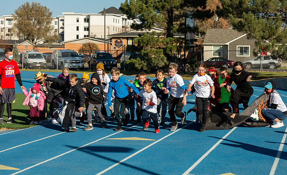 BYU-Idaho employees and their families enjoy a beautiful fall day at the stadium track.