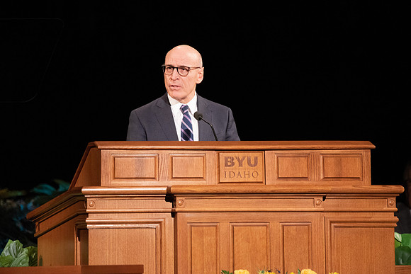 Elder Arnulfo Valenzuela of the Seventy speaks in devotional.