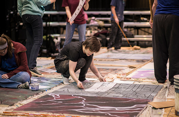 Drama students assist in artwork for theater productions.
