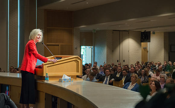 Sister Bonnie Cordon in the General Young Women's Presidency addresses Employees gathered in the Taylor Chapel.