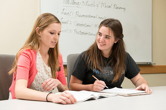 Teacher Education students offer their services tutoring kids 3rd grade to 12th grade. Melody Eliason tutoring Nicole Swain.