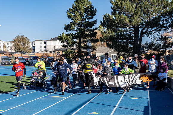 BYU-Idaho employees and their families enjoy a beautiful fall day at the stadium track.