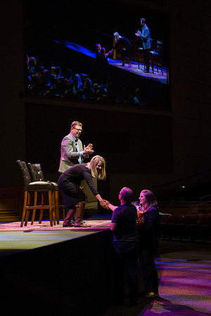 The Gilberts play a getting-to-know-eachother game with the audience to get things warmed up.