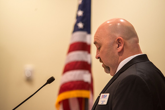 Todd Smith receiving an award on behalf of BYU-Idaho from the Office of the Secretary of Defense for the support BYU-Idaho has given to Peter Stilling while he has been serving in the Guard. Awarded b