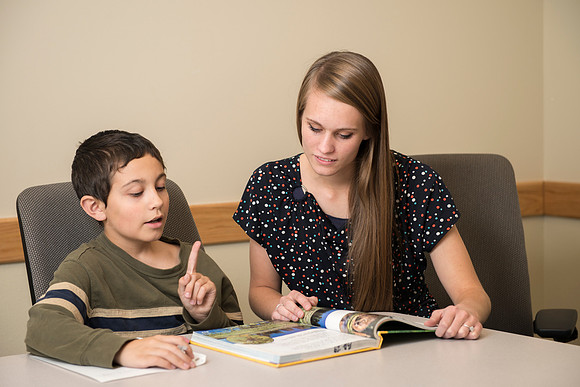 Teacher Education students offer their services tutoring kids 3rd grade to 12th grade. Hannah Paget tutoring Jaden Davis.