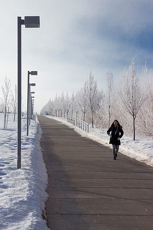 A lone student makes her way to class.